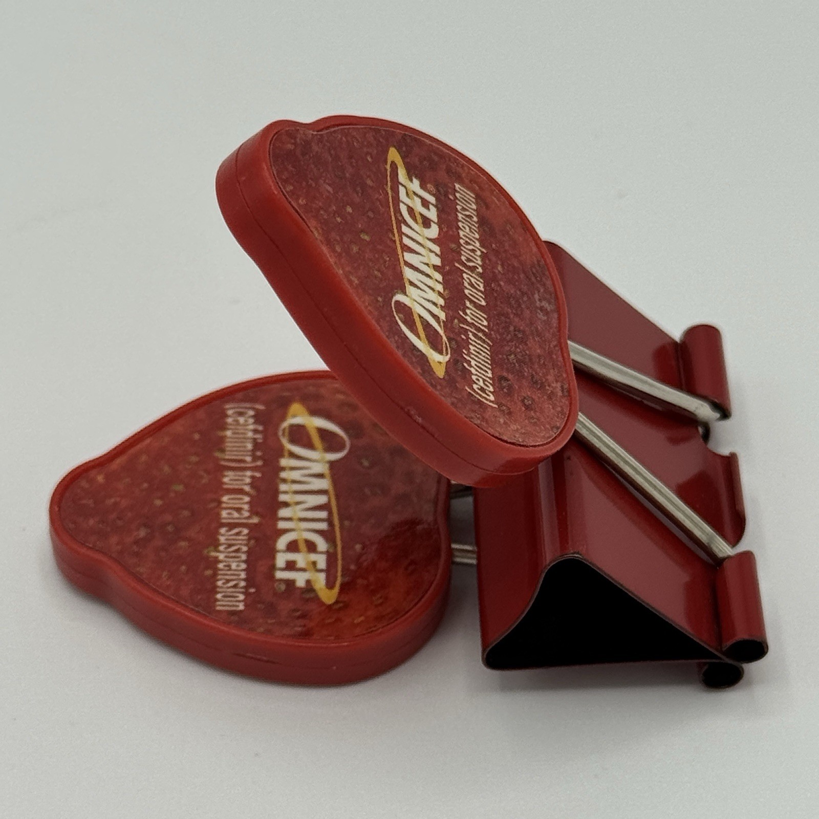 Omnicef cefdinir For Oral Suspension HTF Promotional Strawberry Binder Clip Red