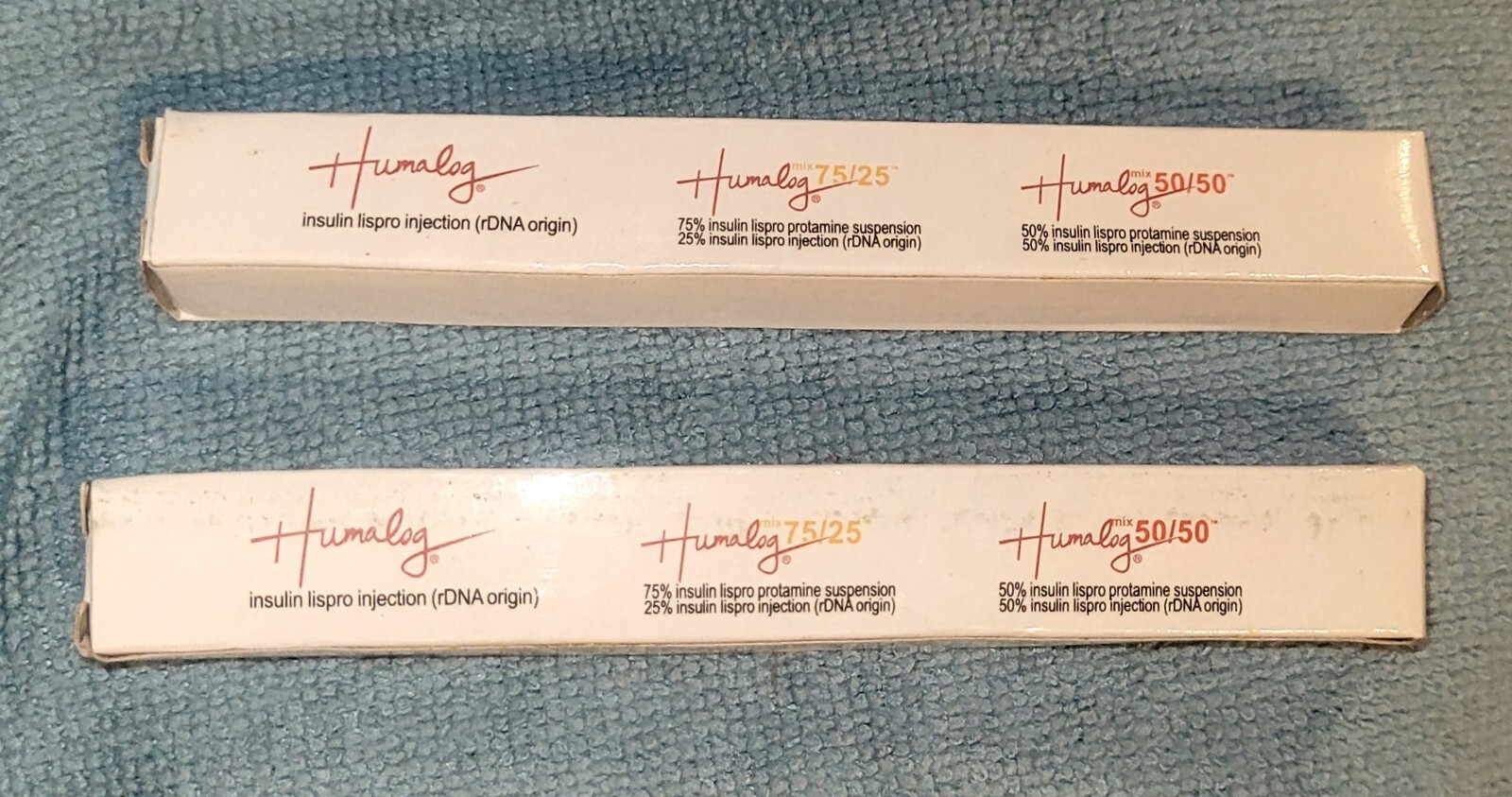 Two Pharmaceutical drug rep collectible pens advertising Humalog NIB