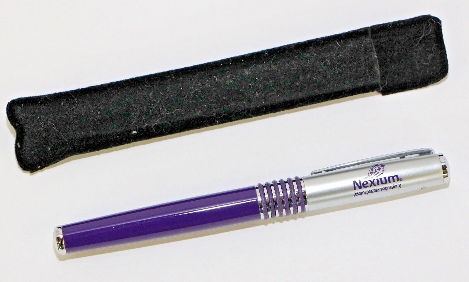 Pharmaceutical Heavy Metal NEXIUM Purple and White New in Sleeve