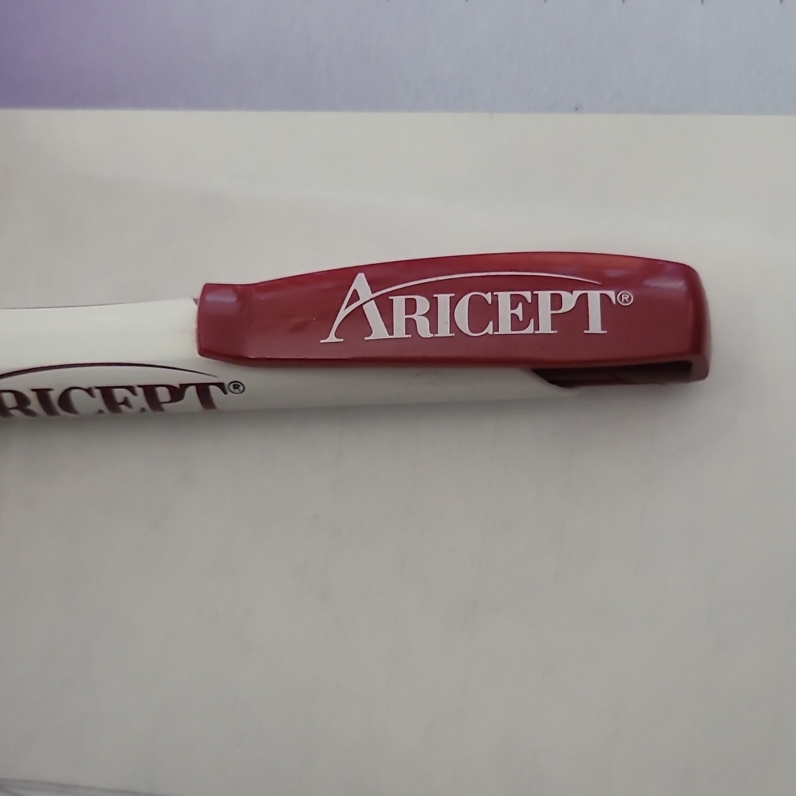 Aricept Donepezil HCl Drug Rep Pharmaceutical Ballpoint Pen White & Red