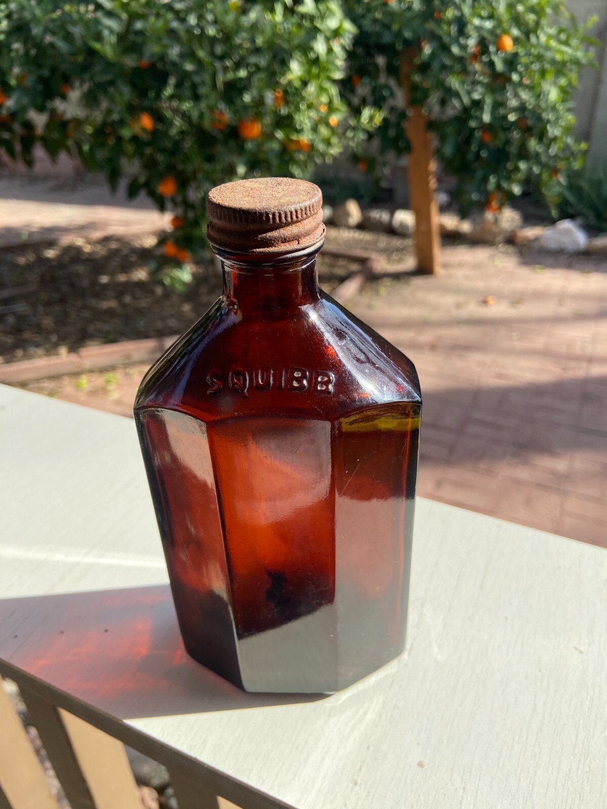 BEAUTIFUL Antique Amber Squibb embossed Glass Drug or Pharmacy Jar, 7” Tall