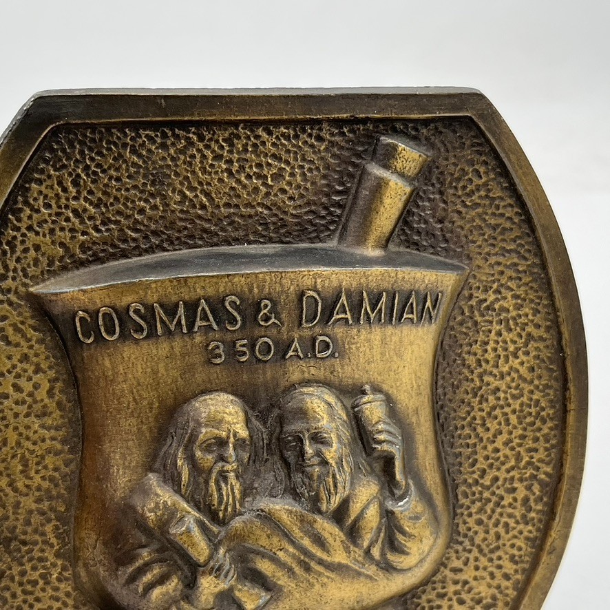 VTG COSMAS AND DAMIAN BRONZE Brass PROMO PLAQUE Advertising Pharmacy Apothecary