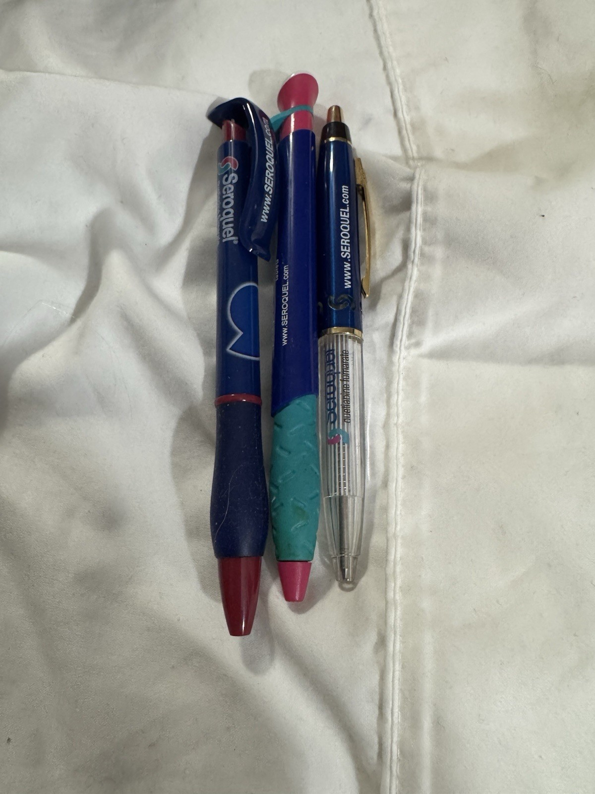 Original Seroquel Pens. One Can Light Up with New Battery. One Still Writes.