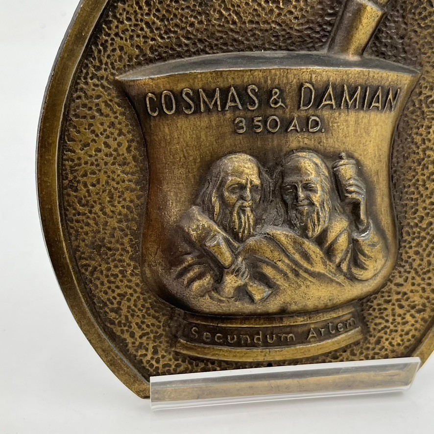 VTG COSMAS AND DAMIAN BRONZE Brass PROMO PLAQUE Advertising Pharmacy Apothecary