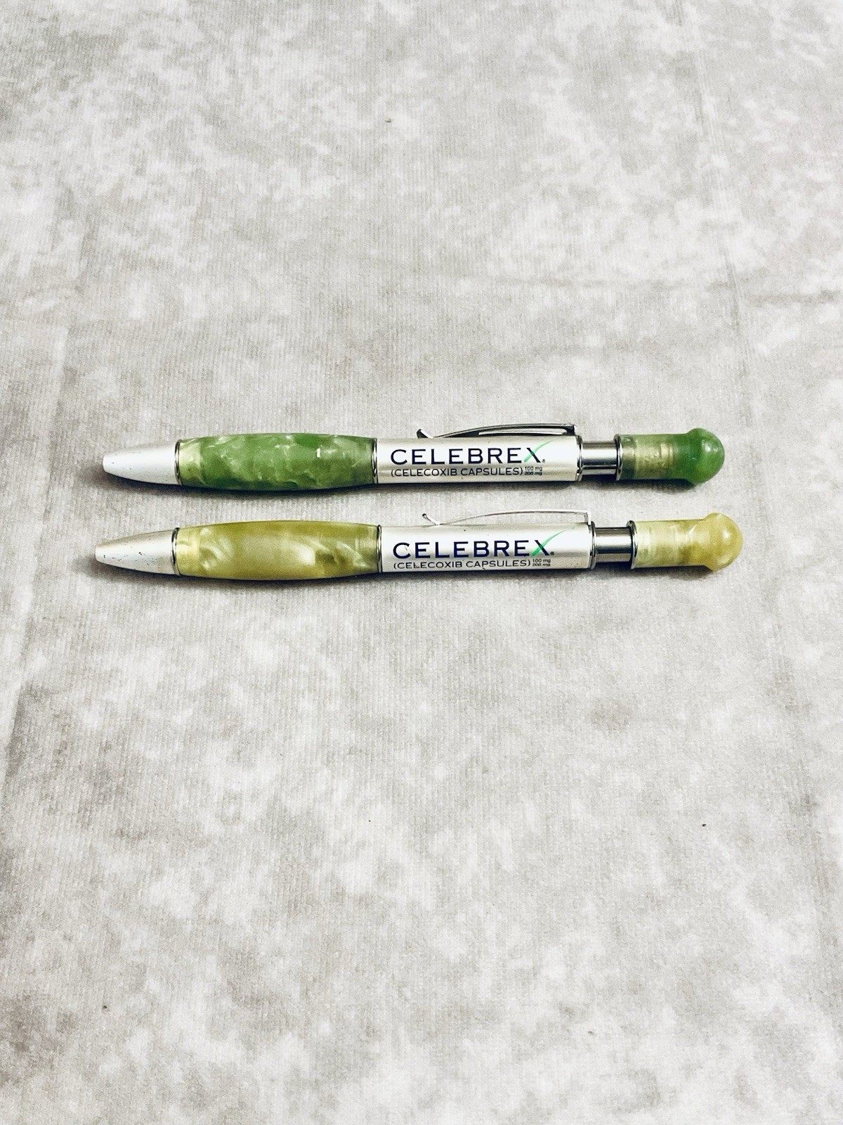 CELEBREX PHARMACEUTICAL REP PEN MARBLED BARREL YELLOW GREEN CHROME CLIP LOT OF 2