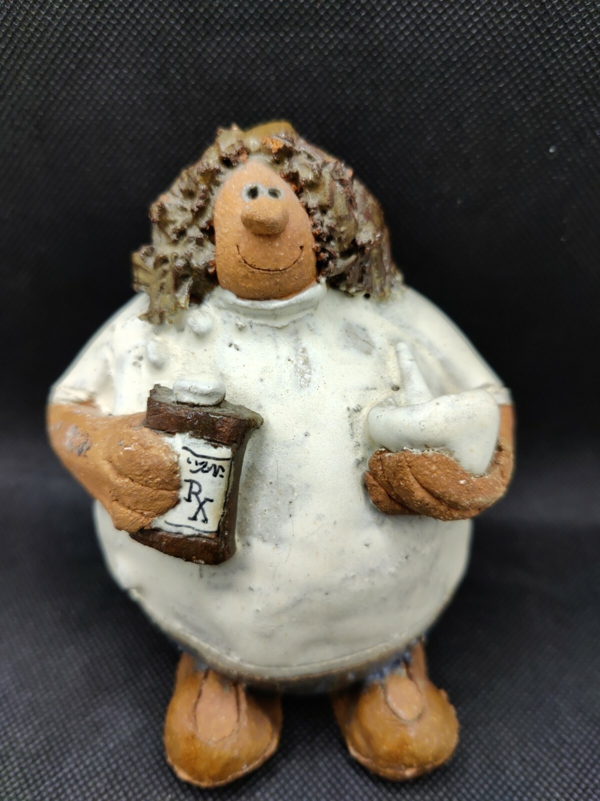 Pharmacist Pottery Figurine.