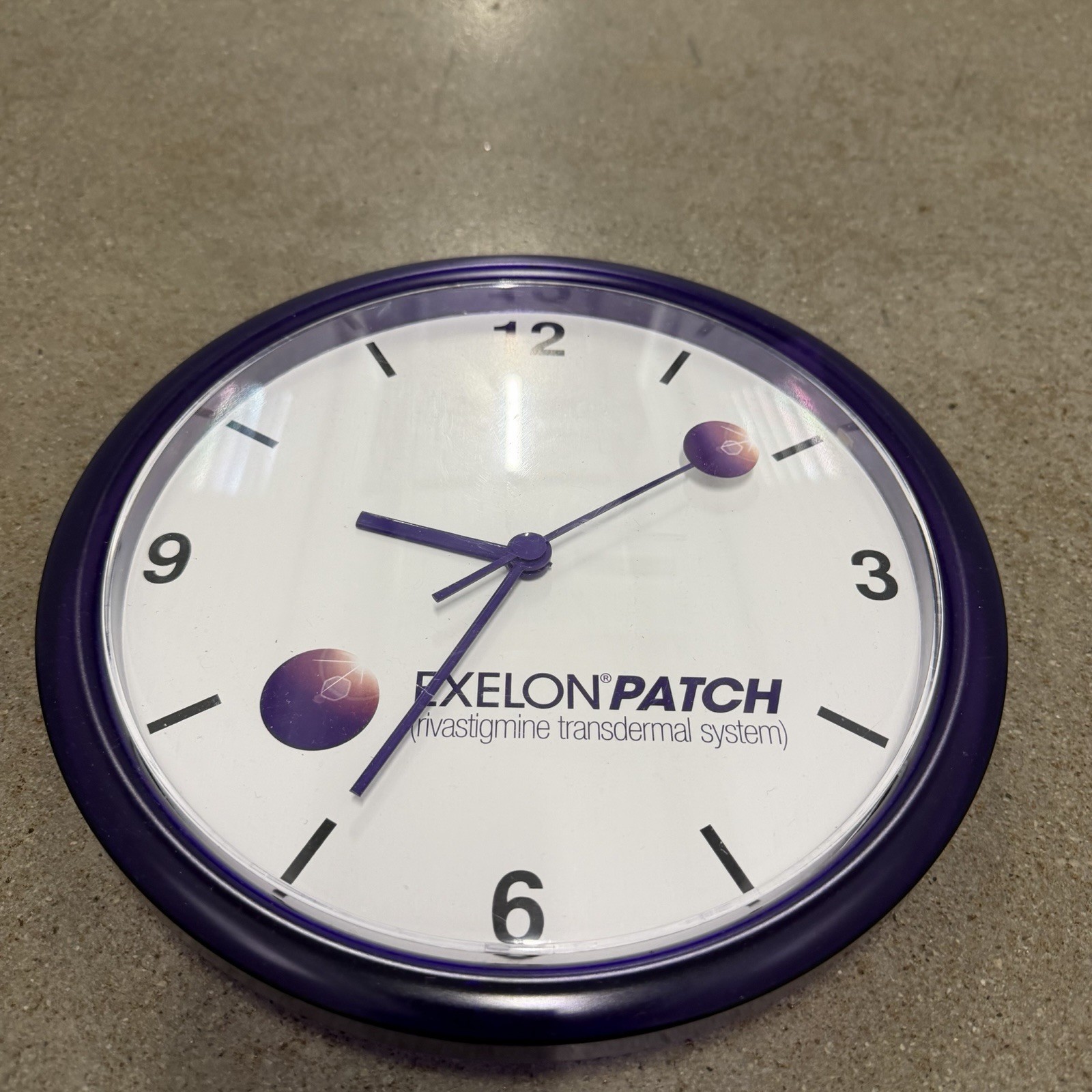 Exelon Patch Pharmaceutical Advertising Purple Wall Clock 10″ Plastic