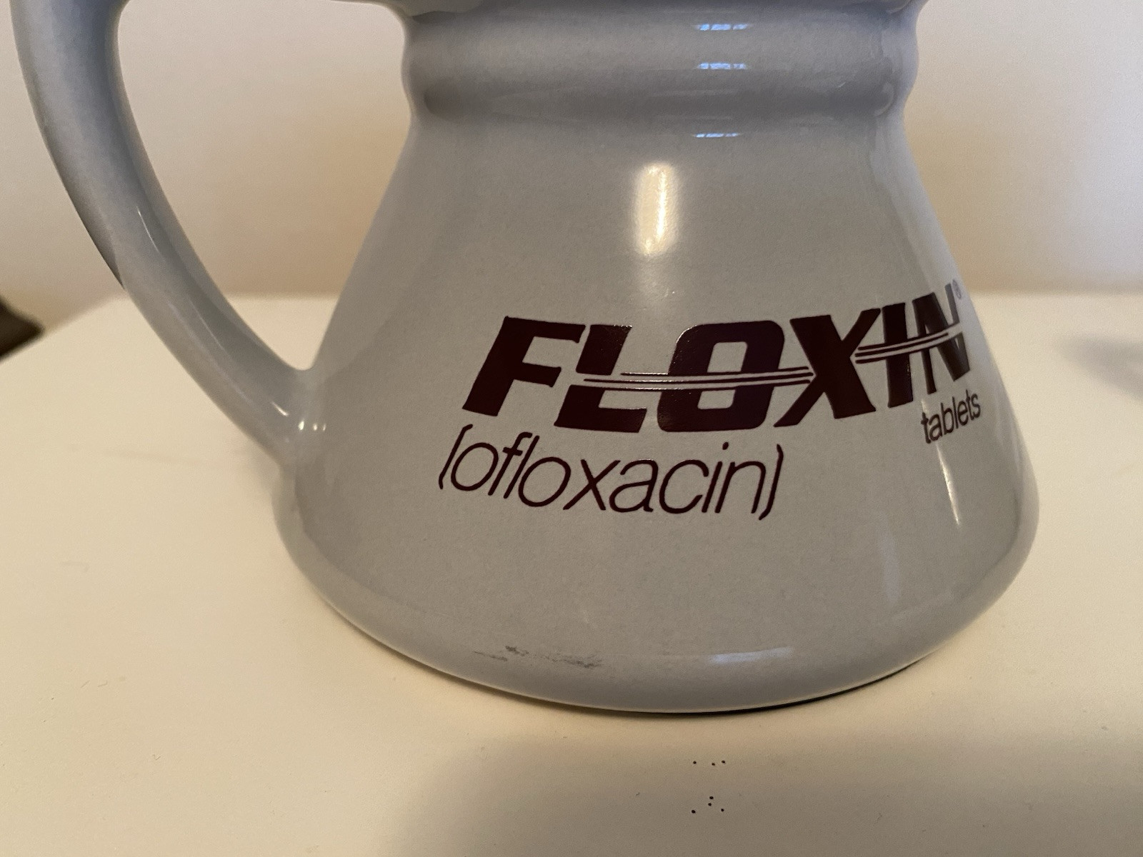 Drug rep Floxin 2 ceramic mugs, paperweight thermometer, canvas laptop bag
