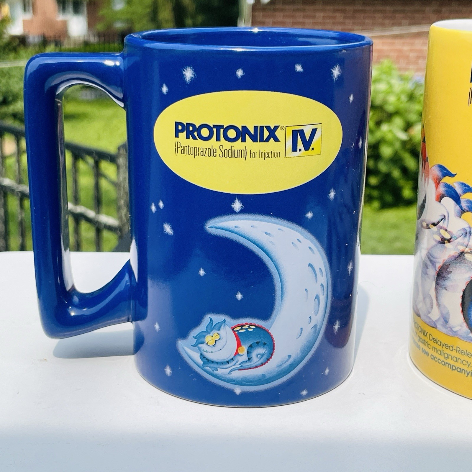 Lot Of 2 Protonix Coffee Mugs Heartburn Monster Pharmaceutical Advertisement