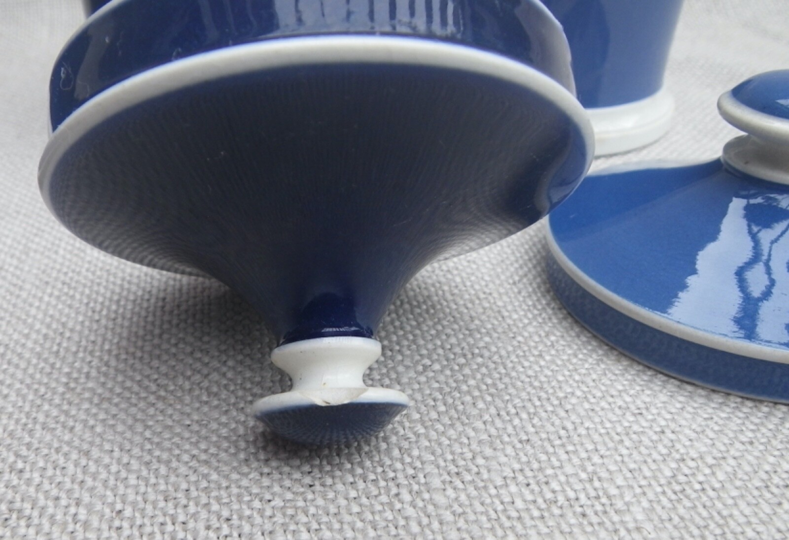 Collection of Small Blue Slip-Decorated Ceramic Apothecary Jars with Lids
