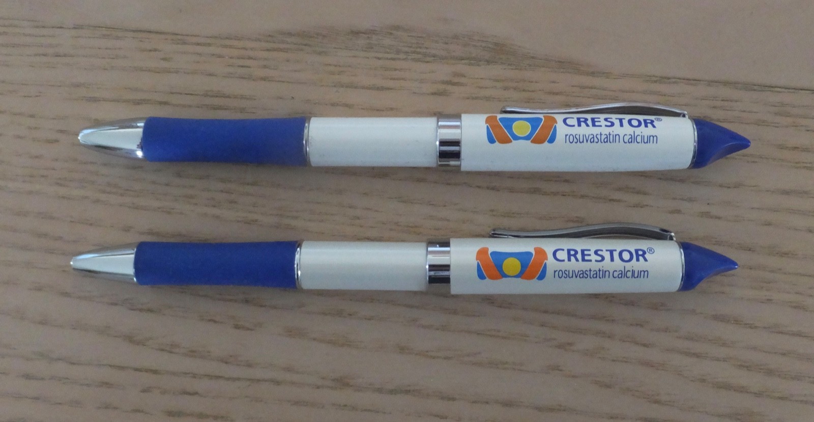 2 CRESTOR Pens, Drug Rep Pharmaceutical Advertising, Heavy Metal, Twist
