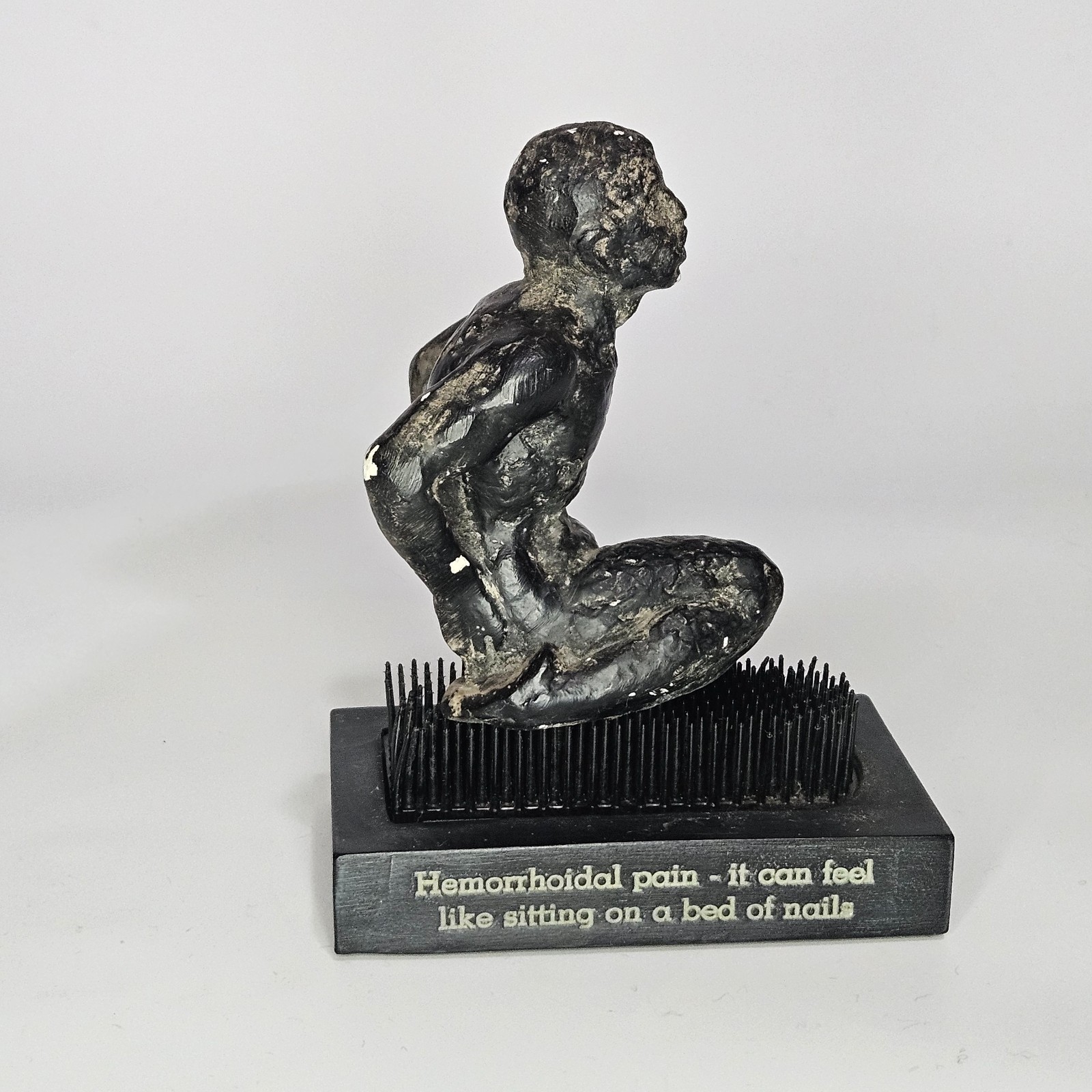 Vintage Proctofoam Pharmaceutical Advertising Bed Of Nails Fakir Figure