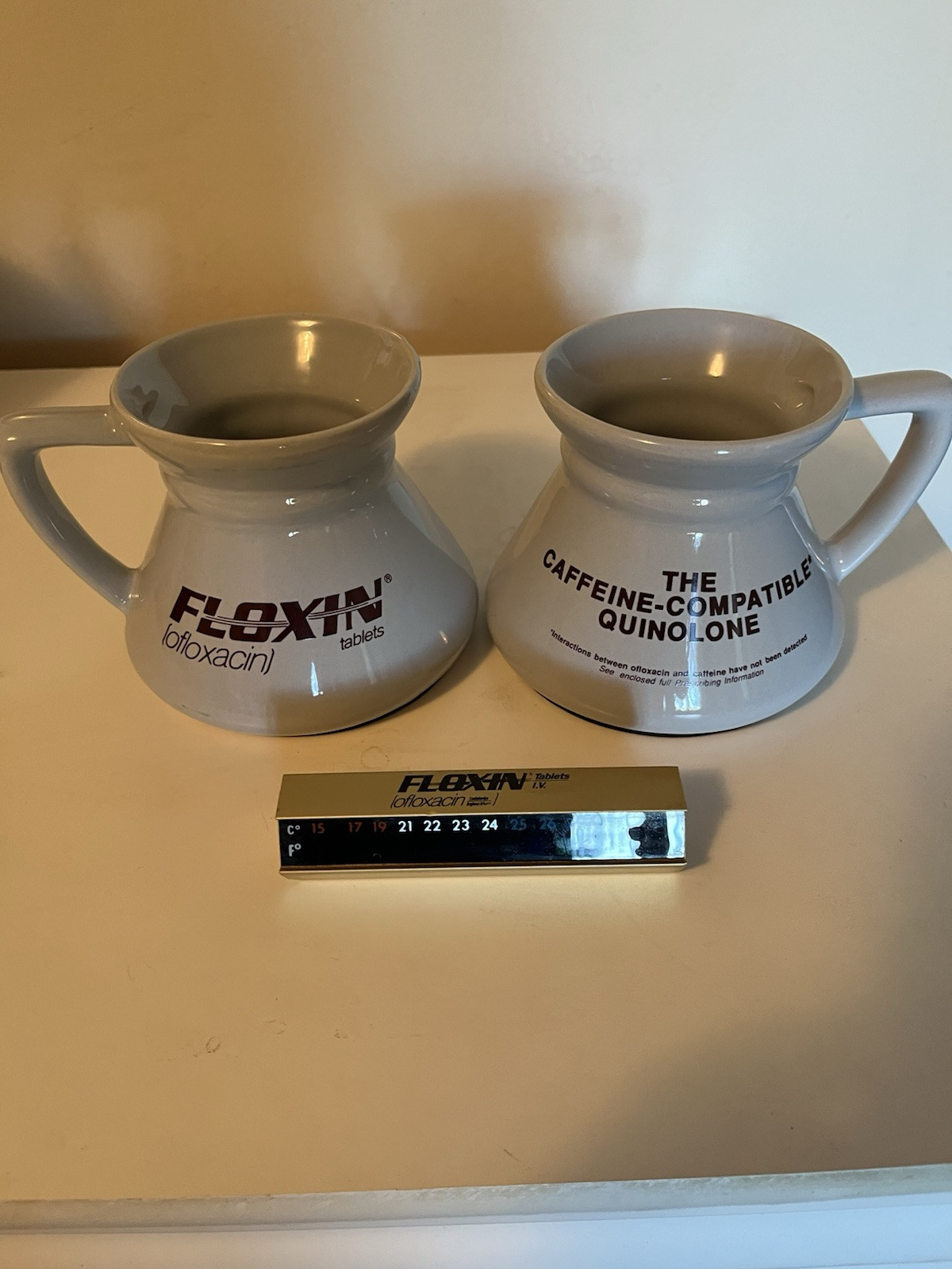 Drug rep Floxin 2 ceramic mugs, paperweight thermometer, canvas laptop bag