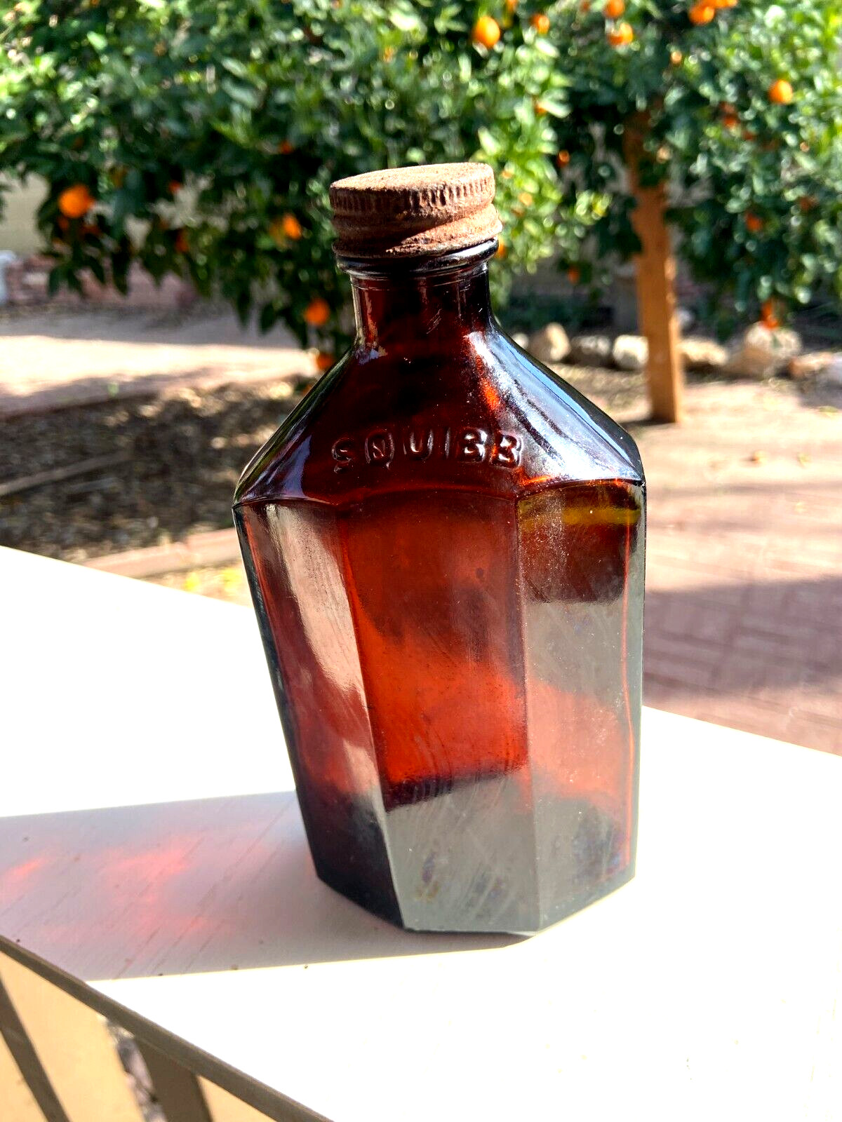 BEAUTIFUL Antique Amber Squibb embossed Glass Drug or Pharmacy Jar, 7” Tall