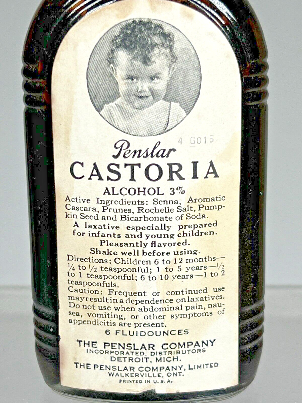 Vintage Brown Glass Bottle Penslar Castoria Detroit Michigan. approx. 6″ tall