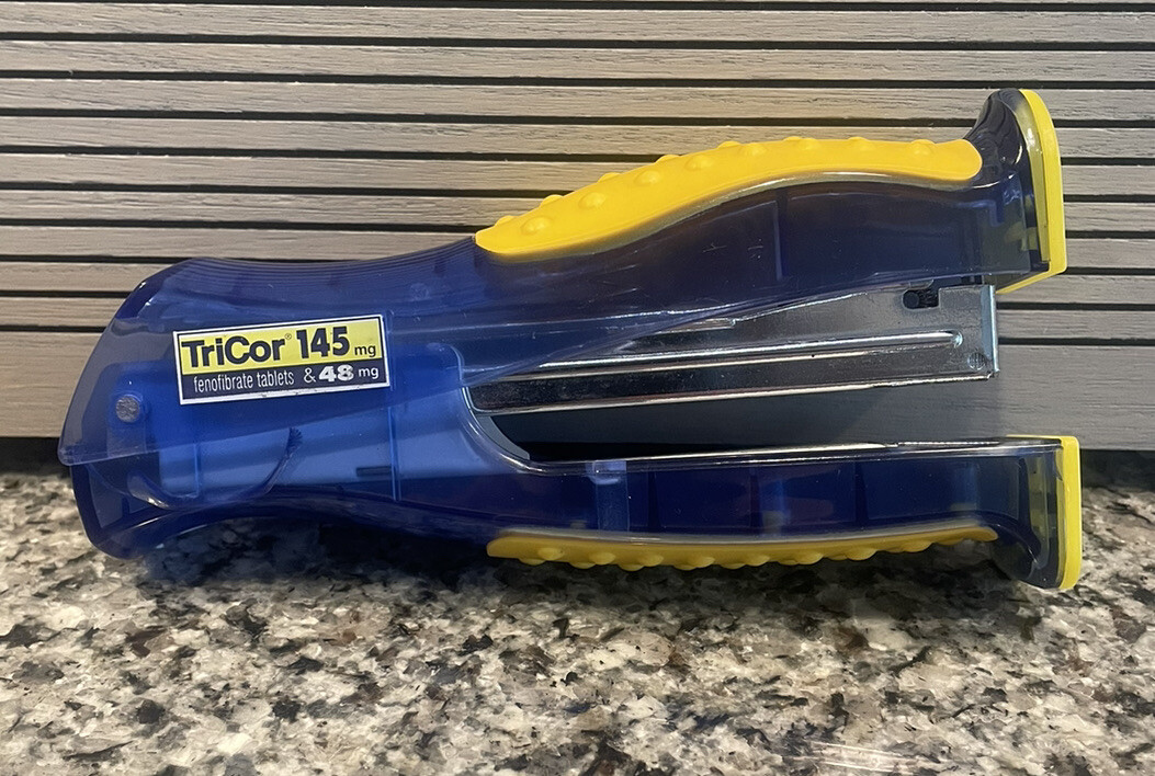 Tricor/Fenofibrate Drug Rep Pharmaceutical Collectible Stapler & Pen Light