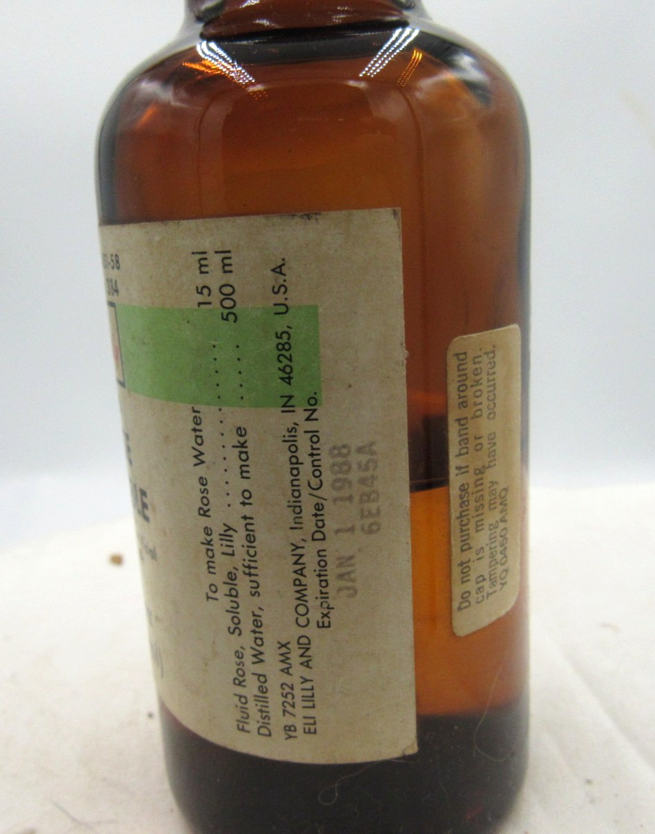 MM – 1980’s Eli Lilly Rose Soluble Indianapolis Ind 4 7/8″ Amber Medicine bottle