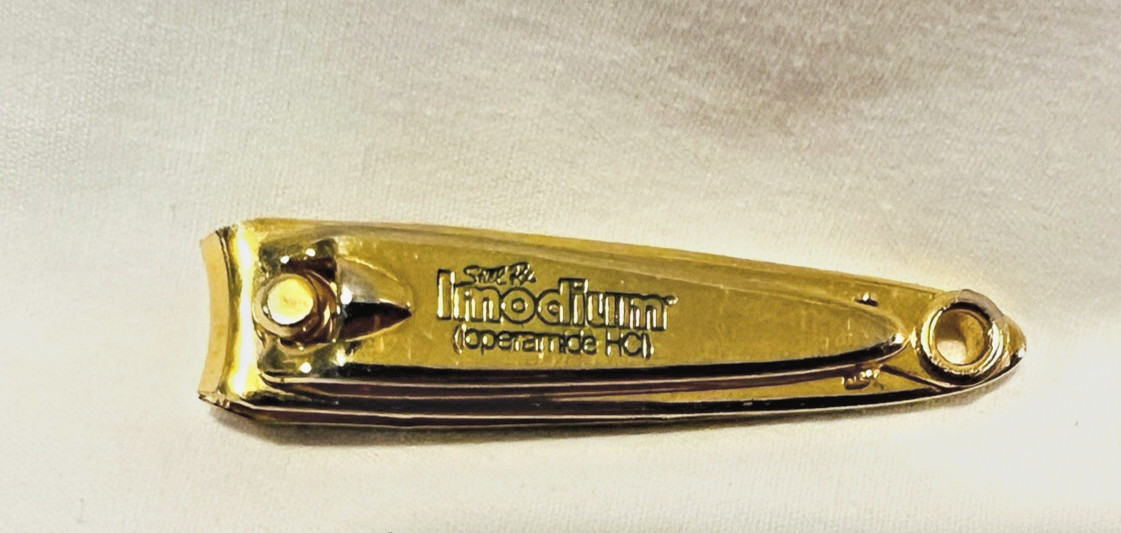 Vtg Pharmaceutical Advertising Promo IMODIUM Nail Clippers Gold Tone USA Made