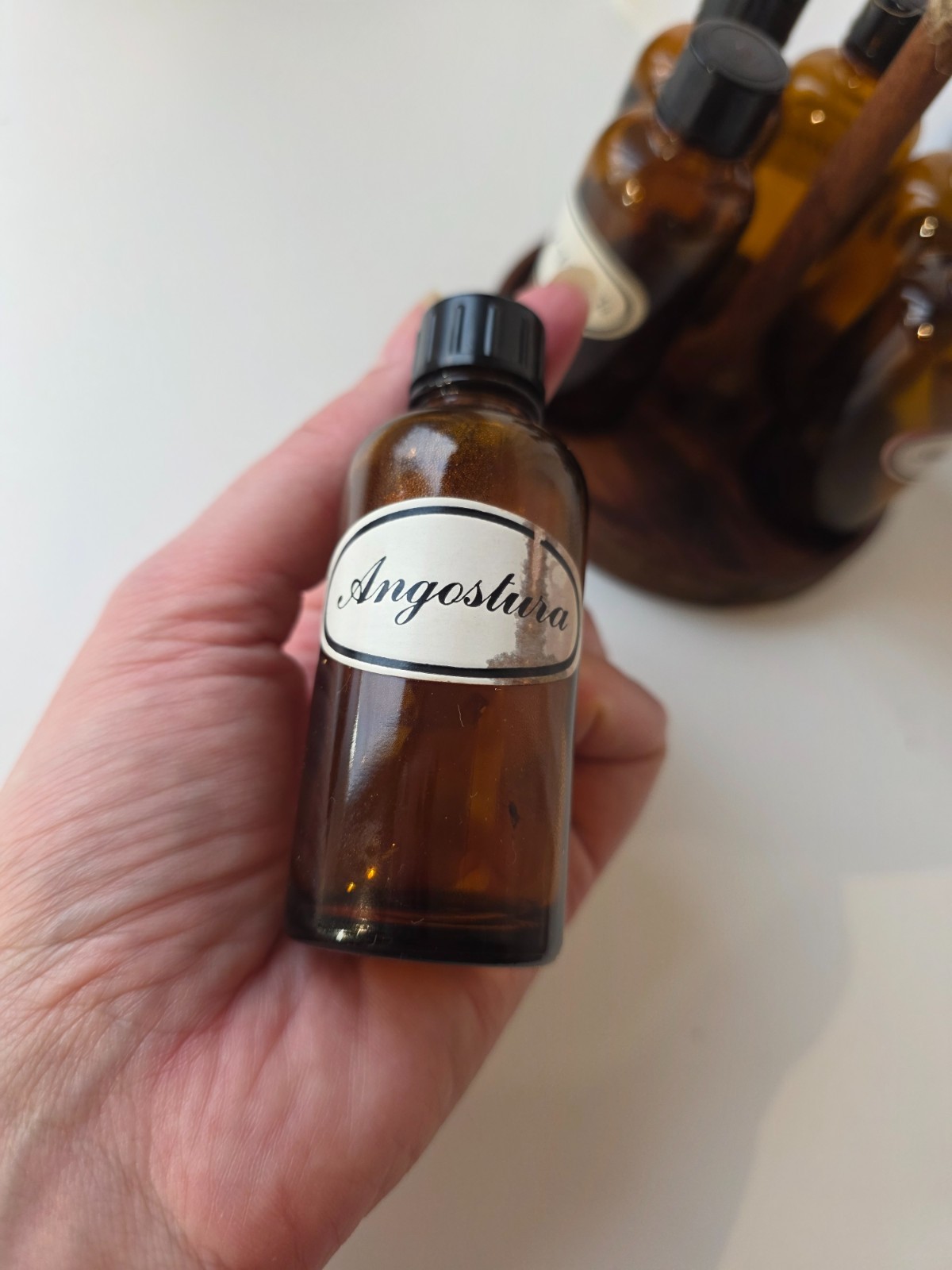 Rare Swedish 1960s apothecary tincture bottles set in wooden stand
