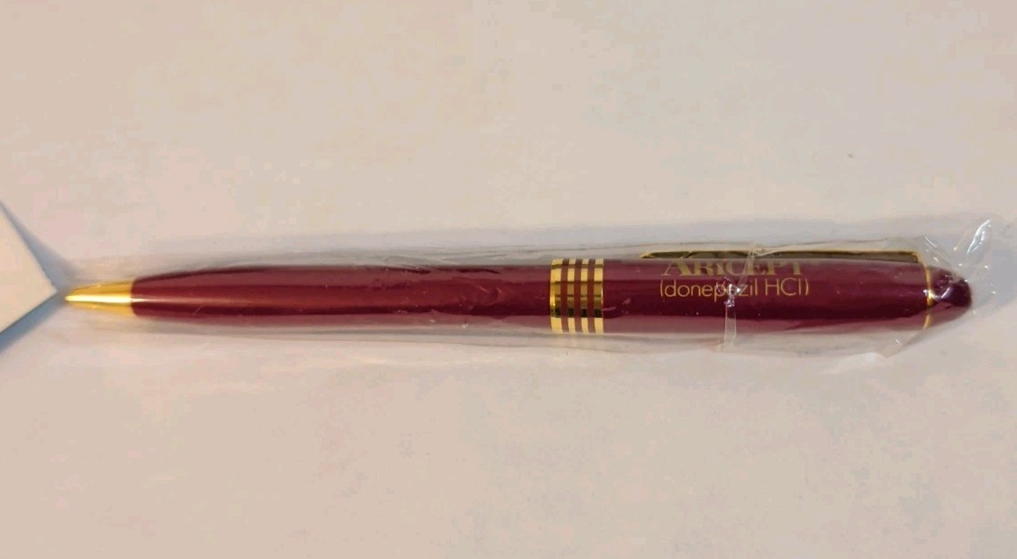 Aricept Red Maroon Gold Metal Click Pharmaceutical Drug Pen Advertising