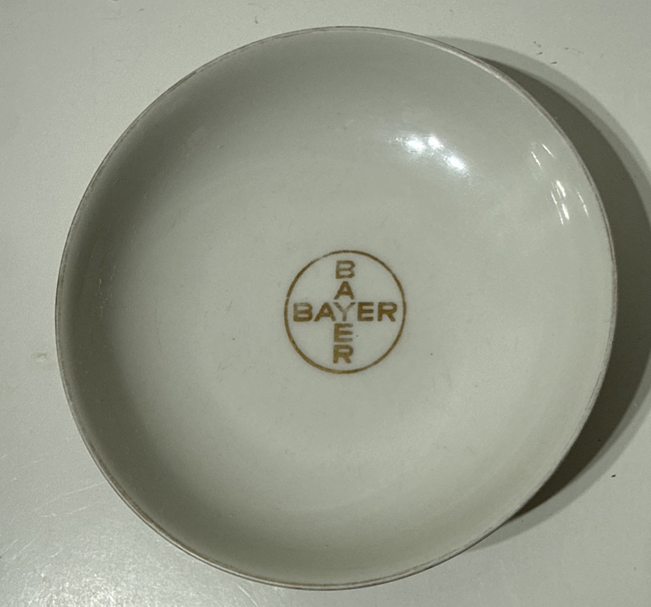 Vtg Bayer Haus Pharmacy Advertisement Promo Porcelain Dish Gold Cross Logo 1952