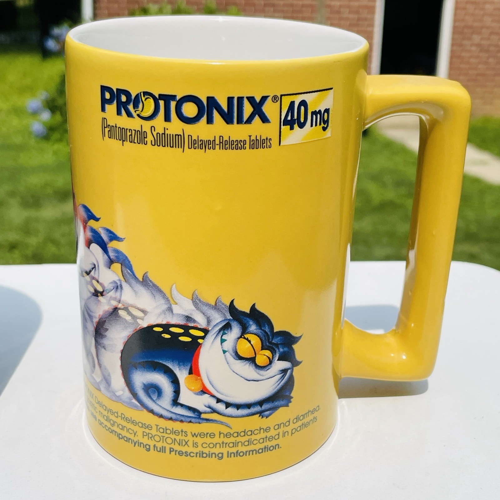 Lot Of 2 Protonix Coffee Mugs Heartburn Monster Pharmaceutical Advertisement
