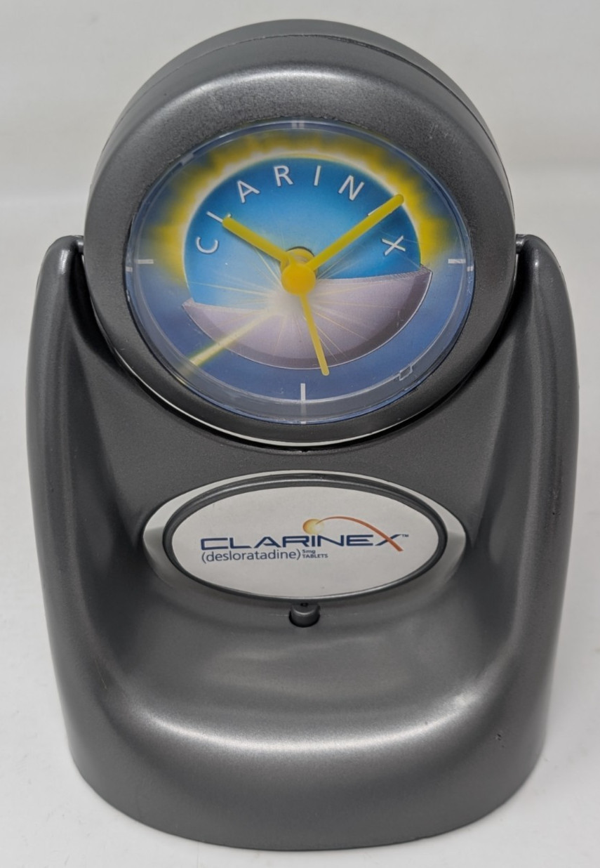 Clarinex Pharmaceutical Advertising Silver Plastic Clock 7″Tall Drug Rep MOVING