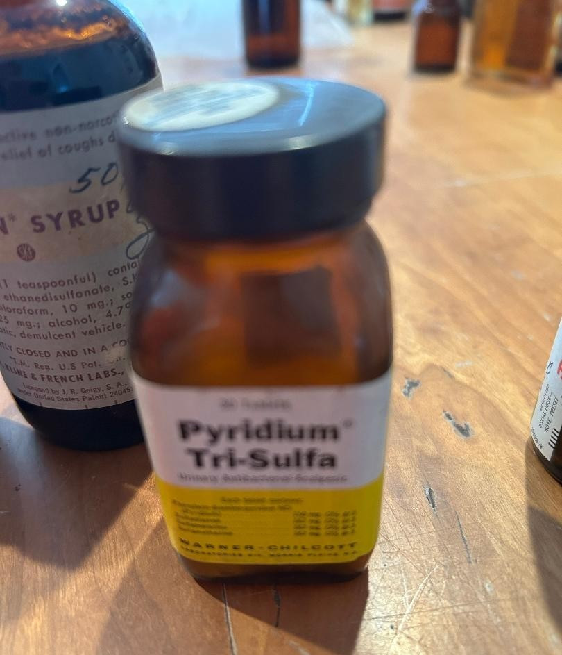 4 glass medicine bottles, Thyroid, Iodin ration, Pyridium Tri-Sulfa, Toryn Syrup