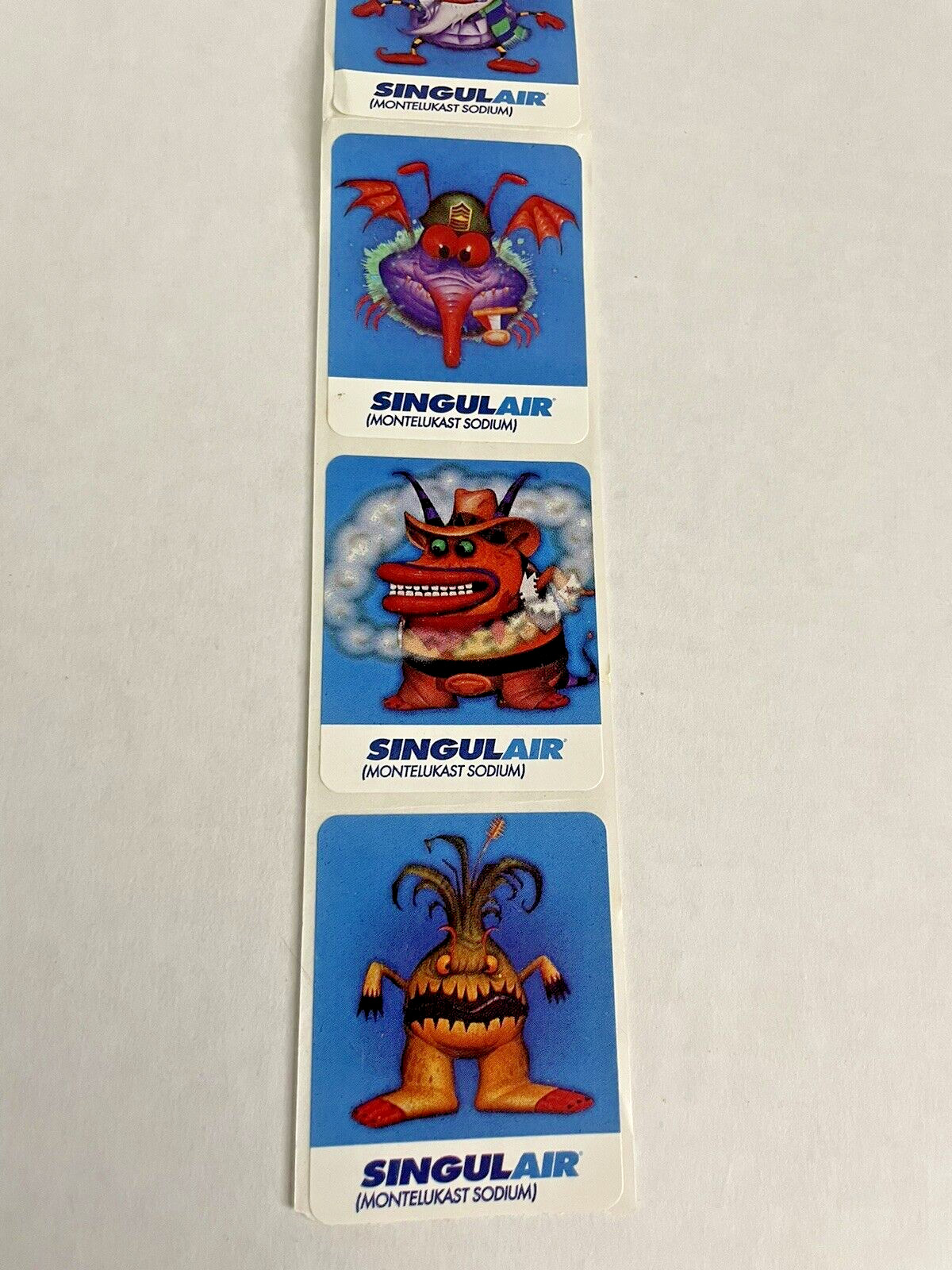 Vintage SINGULAIR Monster Stickers Lot of 6 Collectible Pharmaceutical Drug Rep