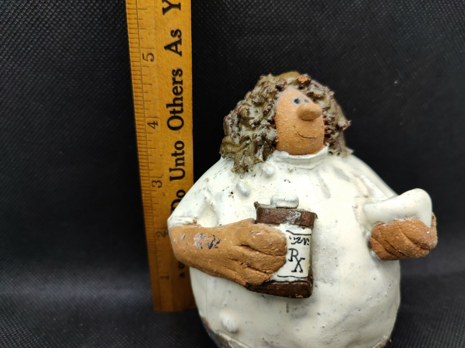 Pharmacist Pottery Figurine.