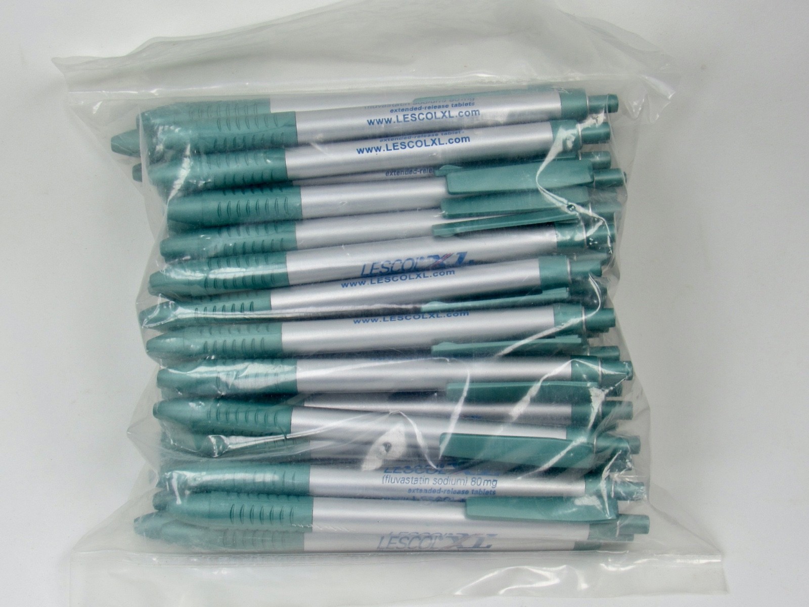Lot of 50 Silver & Green Lescol XL Drug Rep Pharmaceutical Promo Pens Sealed Bag