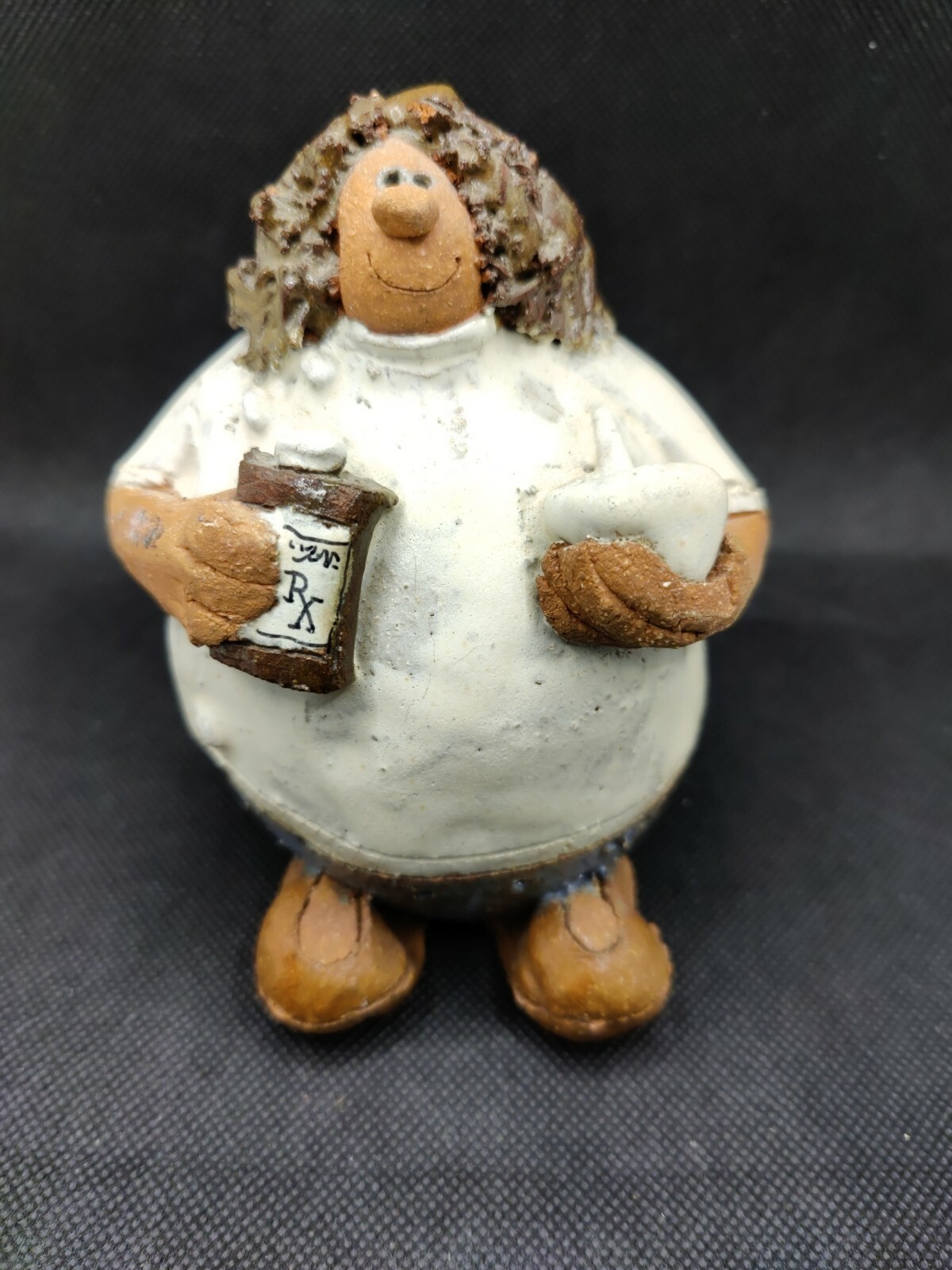 Pharmacist Pottery Figurine.