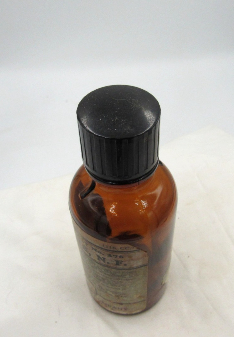 BW – 1940’s Eli Lilly Rhubarb Indianapolis Ind 5 1/4″ Amber Medicine bottle