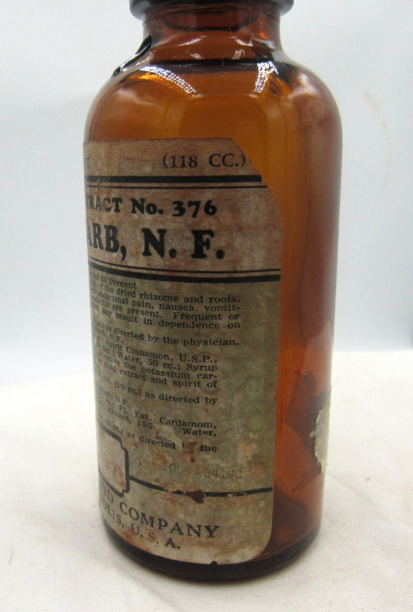 BW – 1940’s Eli Lilly Rhubarb Indianapolis Ind 5 1/4″ Amber Medicine bottle