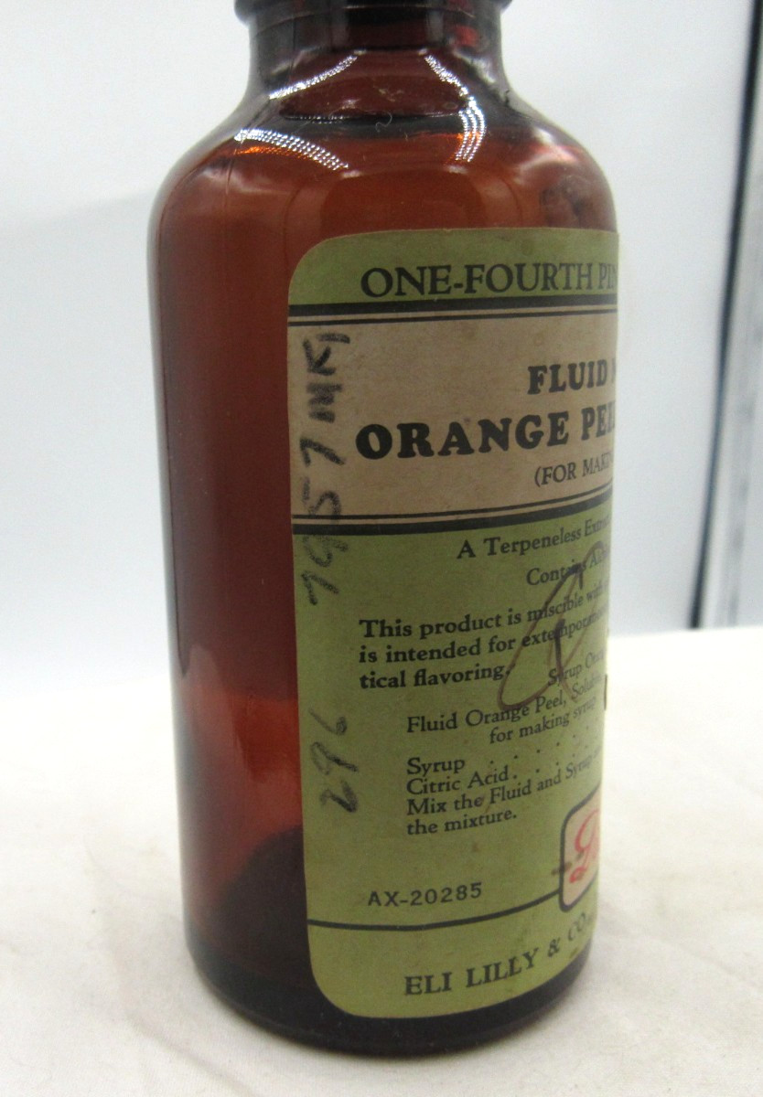 BW – 1940’s Eli Lilly Orange Peel Indianapolis Ind 5 1/4″ Amber Medicine bottle