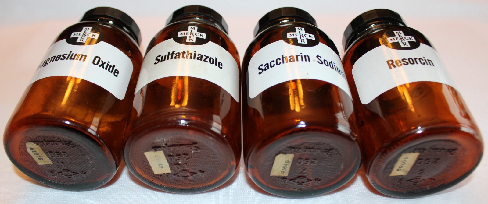LOT OF 4 VINTAGE AMBER MEREK PHARMACEUTICAL APOTHECARY-MEDICINE BOTTLES 5″ JARS