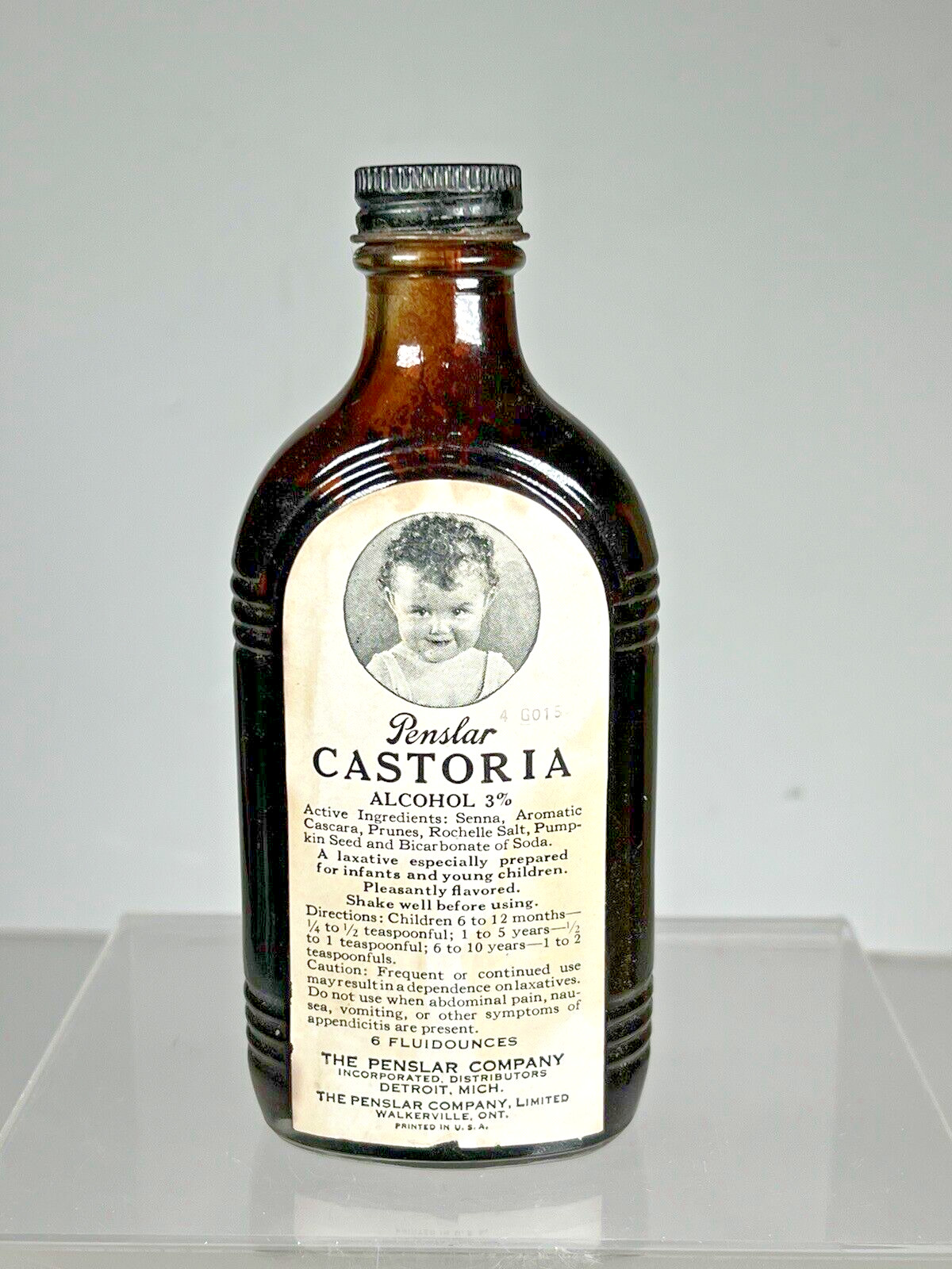 Vintage Brown Glass Bottle Penslar Castoria Detroit Michigan. approx. 6″ tall