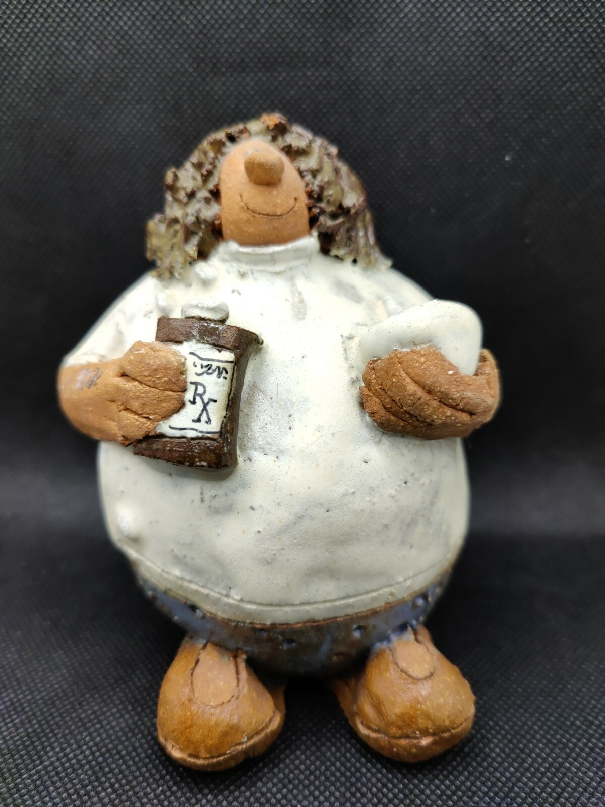 Pharmacist Pottery Figurine.