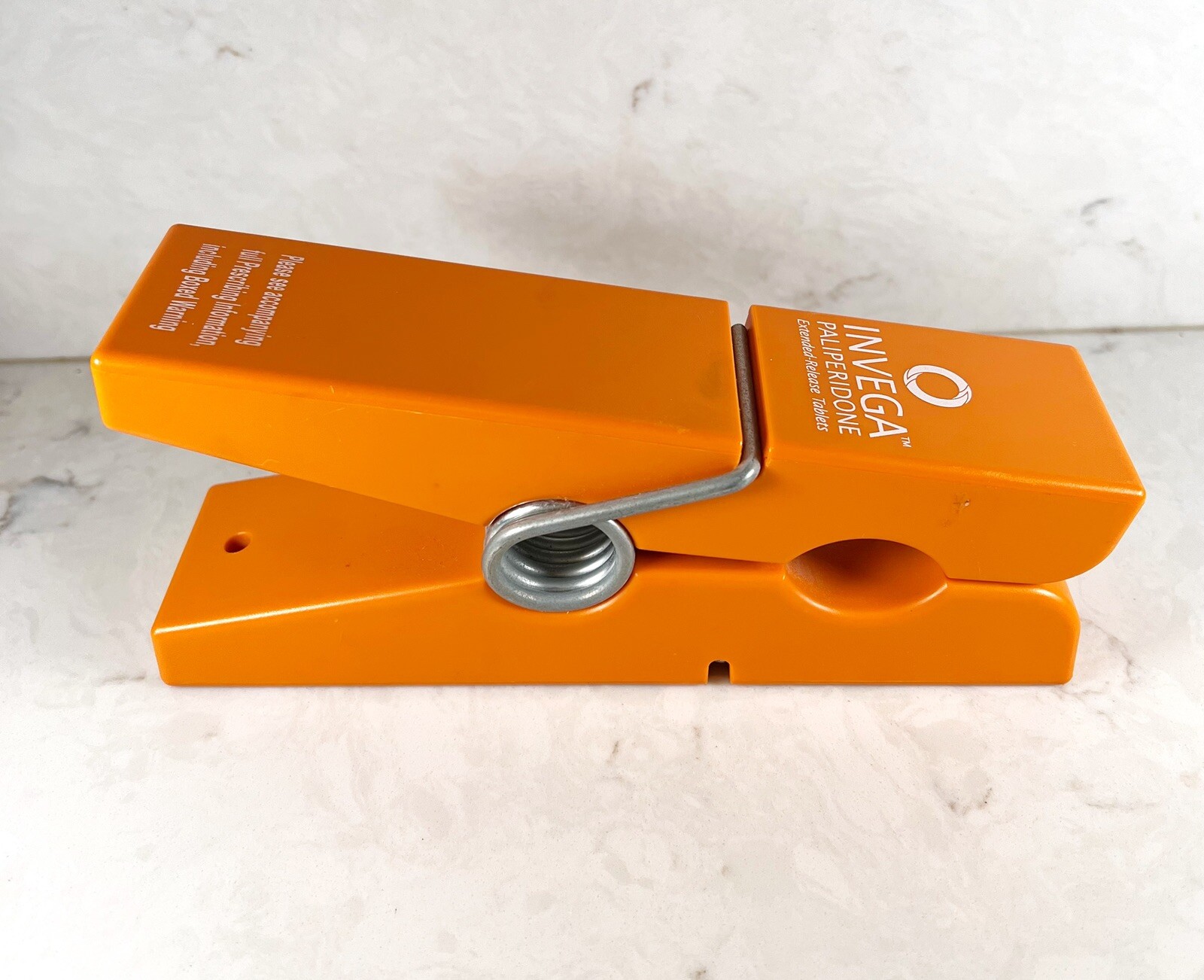 Medical Advertisement Promotional Invega Paliperidone XL Orange Clothespin Desk