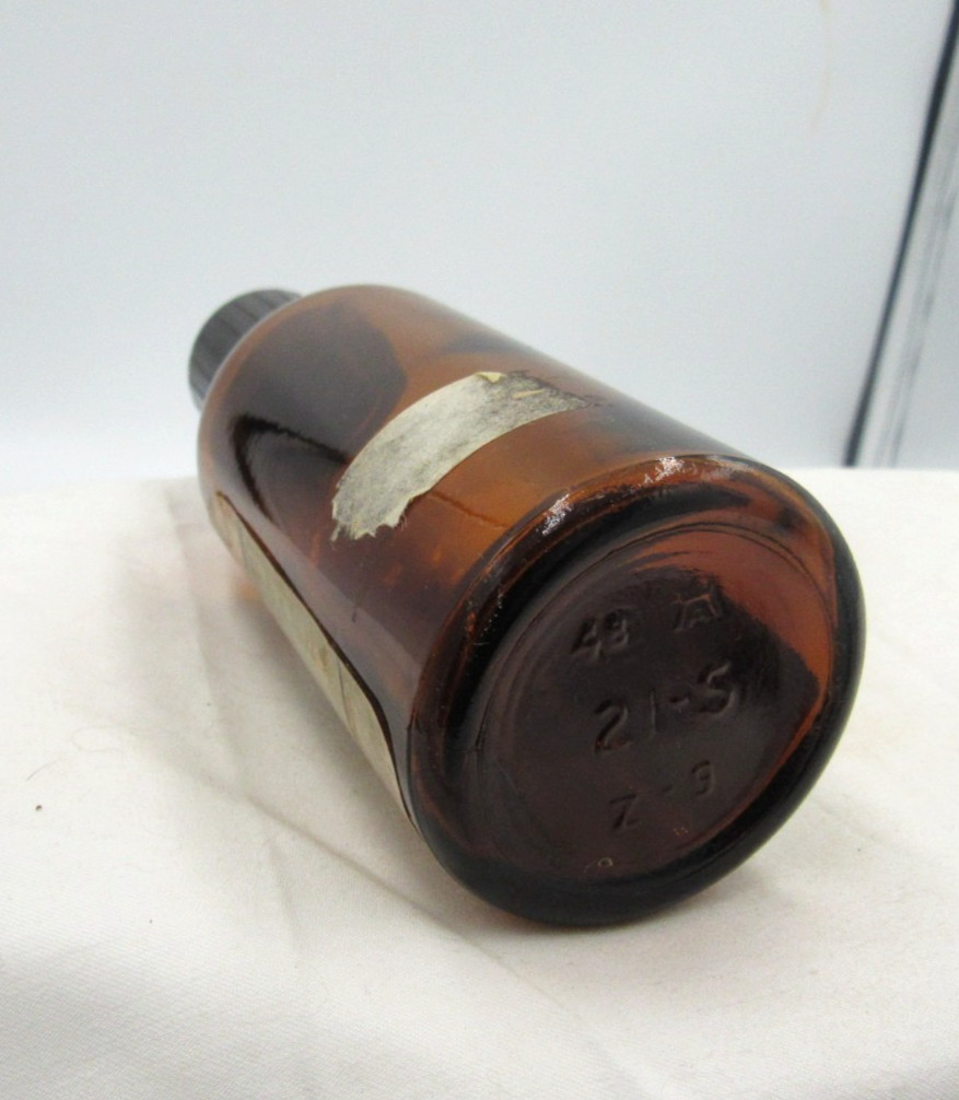 BW – 1940’s Eli Lilly Rhubarb Indianapolis Ind 5 1/4″ Amber Medicine bottle