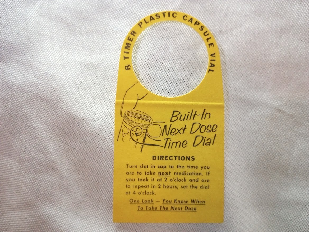 13 vintage “Time Plastic Capsule Vial” prescription dose drug store labels