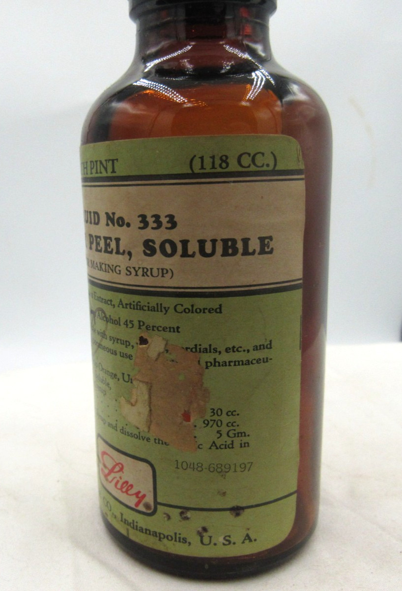 BW – 1940’s Eli Lilly Orange Peel Indianapolis Ind 5 1/4″ Amber Medicine bottle