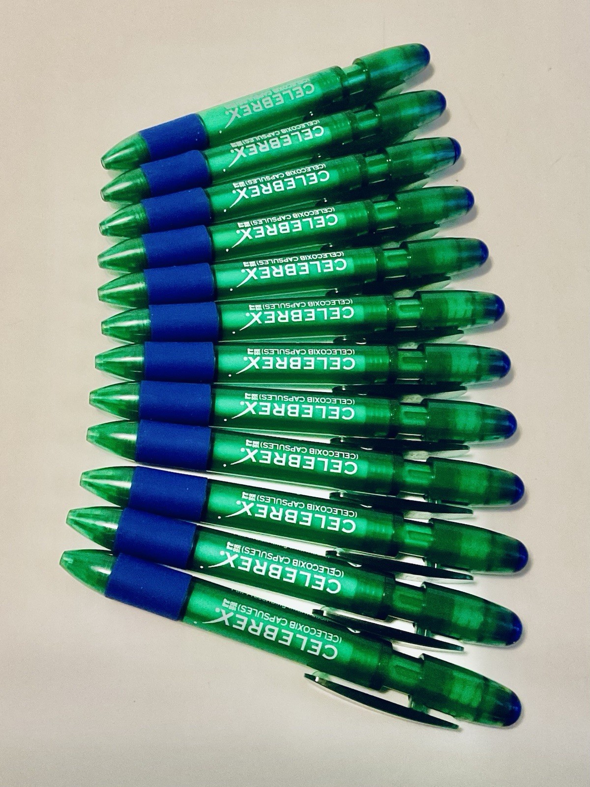 CELEBREX PHARMACEUTICAL REP PENS 5” RETRACTABLE GREEN PURPLE GRIPS LOT OF 12