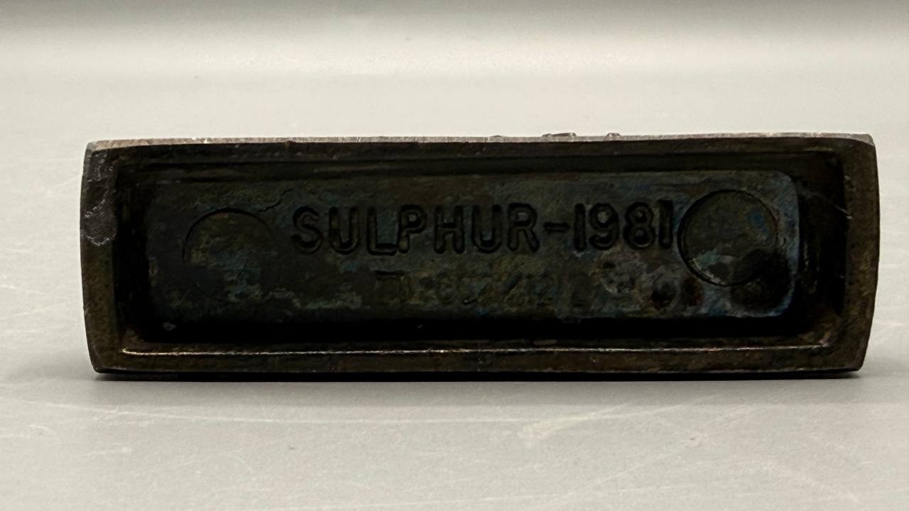 Vintage Tinactin Pharmaceutical Sulphur Symbol Metal Paperweight (1981)