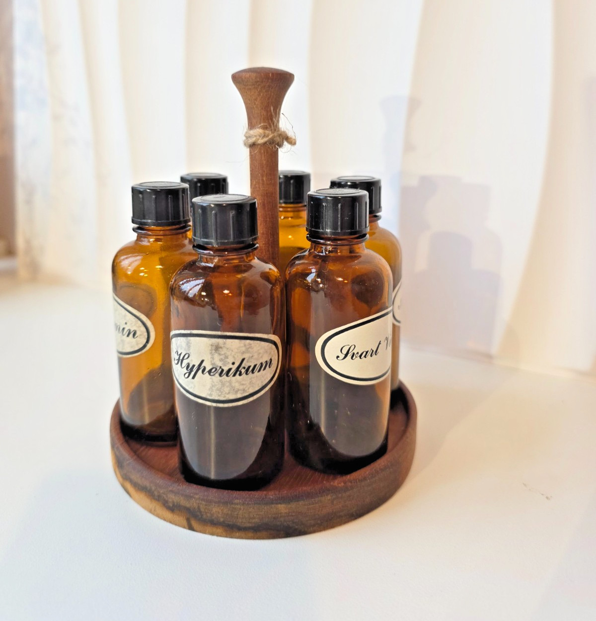 Rare Swedish 1960s apothecary tincture bottles set in wooden stand