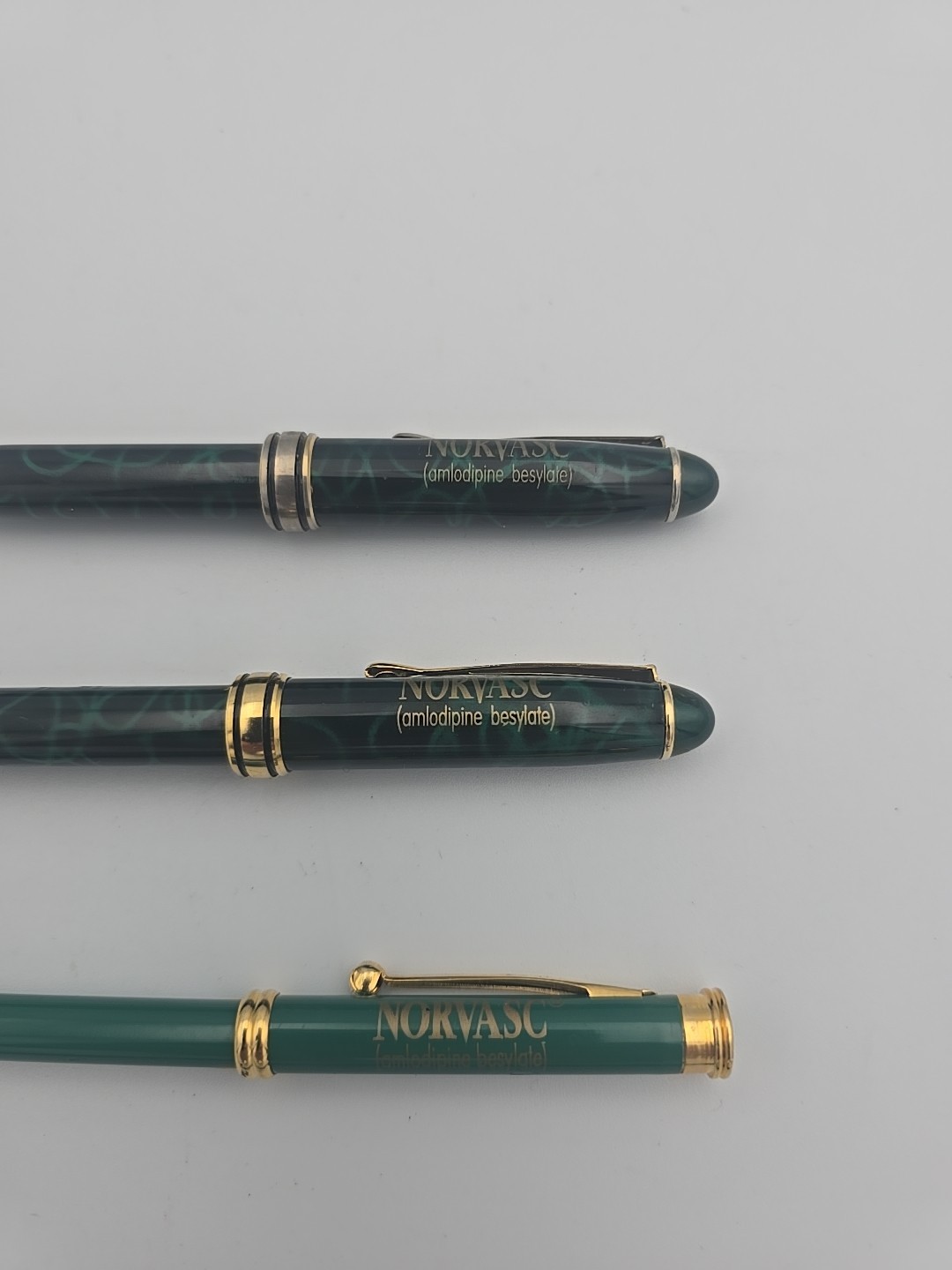 Pharmaceutical Drug Rep Pen Norvasc Gold Green Black Metal Lot 3