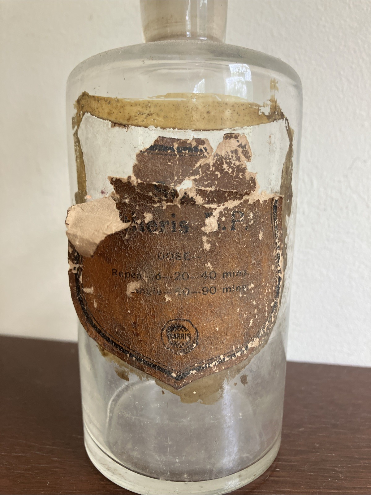 Antique Glass Apothecary Bottle With Tatty Shield Shaped Label, Glass Stopper