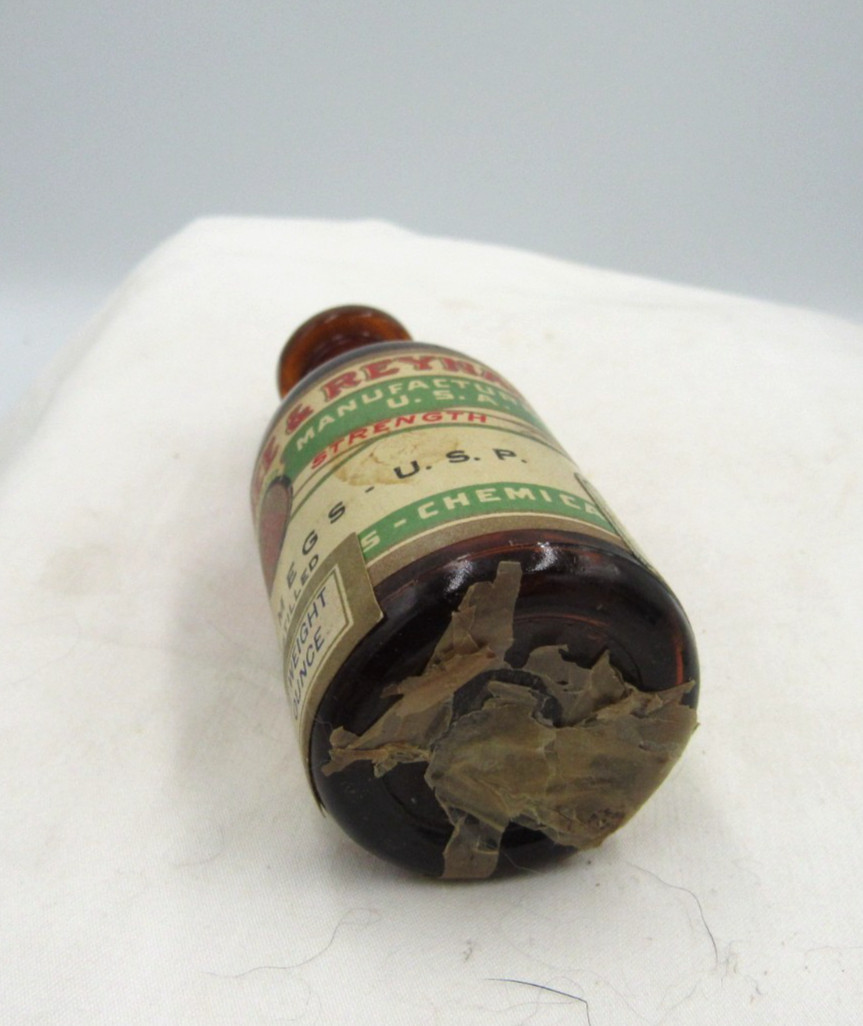 BW – 1920’s Magnus, Mabee & Reynard Oil of Nutmeg 3 1/4 ” Amber Medicine bottle