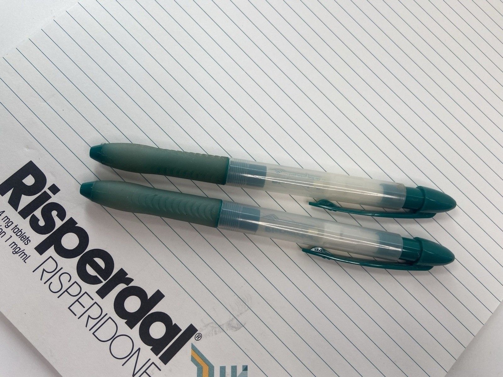 Lot of 2 Risperdal Medical Drug Rep Pharmaceutical Pens White Green And Notepad