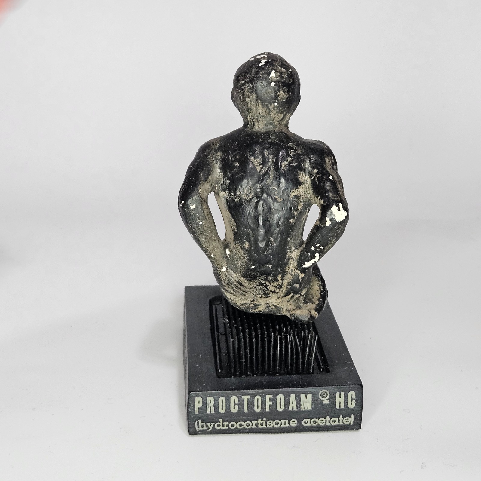Vintage Proctofoam Pharmaceutical Advertising Bed Of Nails Fakir Figure